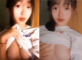 Bé Na tự tin với vòng một nóng bỏng và căng tràn của mình
