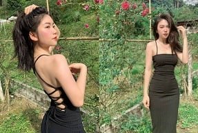Очаровательный клип Le Minh Nguyet в середине блестящего цветочного поля